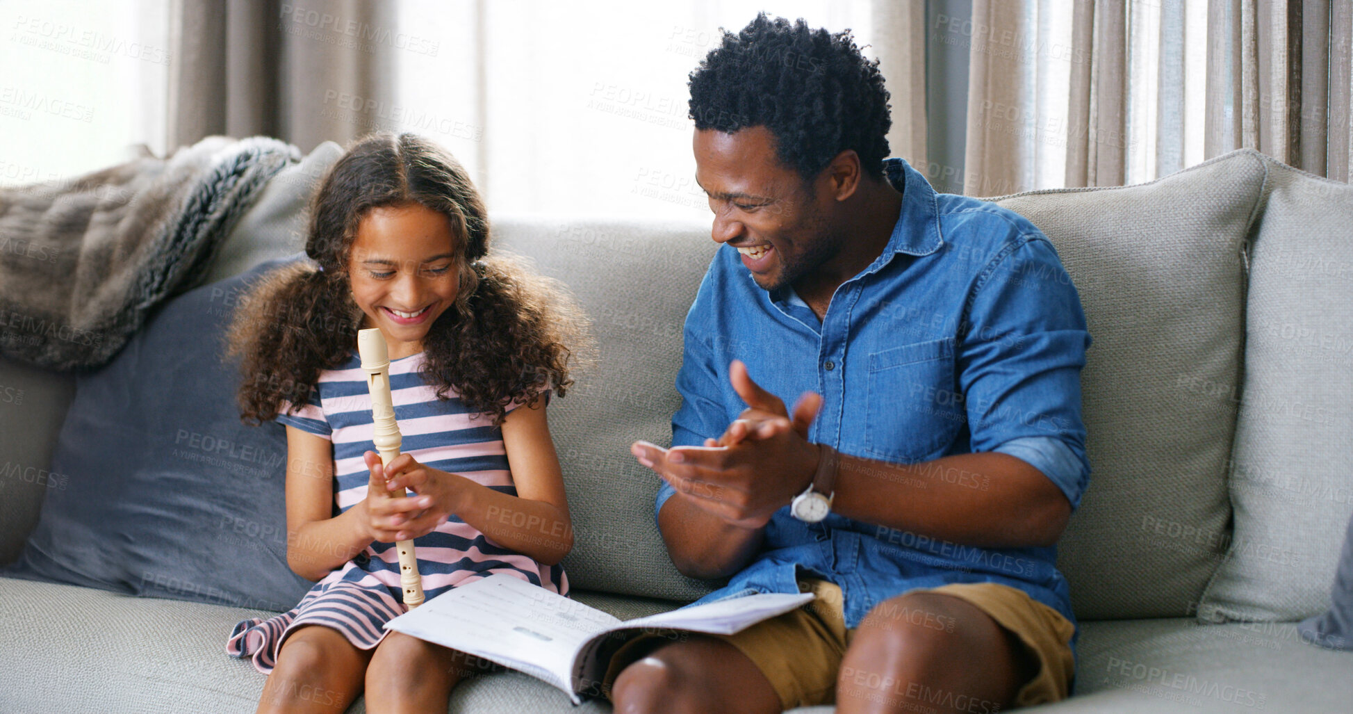 Buy stock photo Learning, music and kid with father for flute lesson on sofa with book for notes in home. Education, bonding and dad teaching girl child to play recorder instrument for talent development in house.