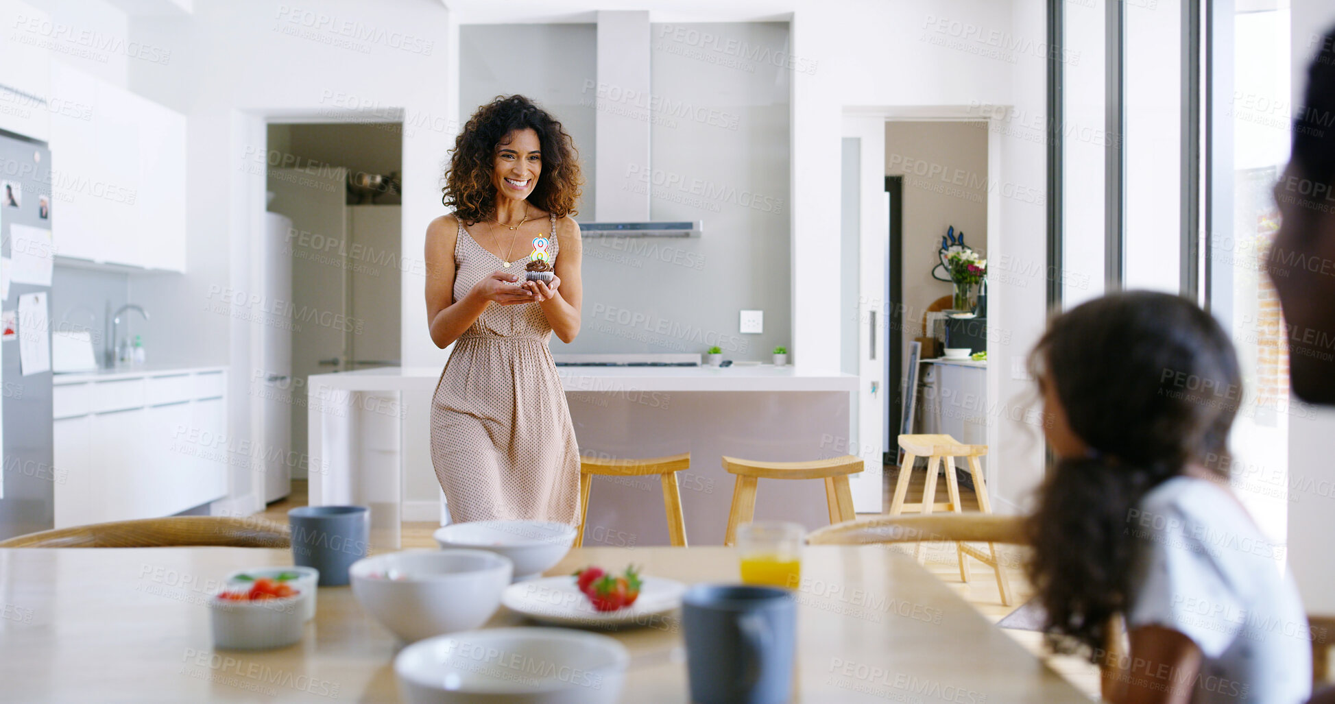 Buy stock photo Family, house and woman with cupcake, birthday and dessert for celebration, happy and gift in kitchen. Apartment, people and mother with muffin for party, child and surprise for special occasion