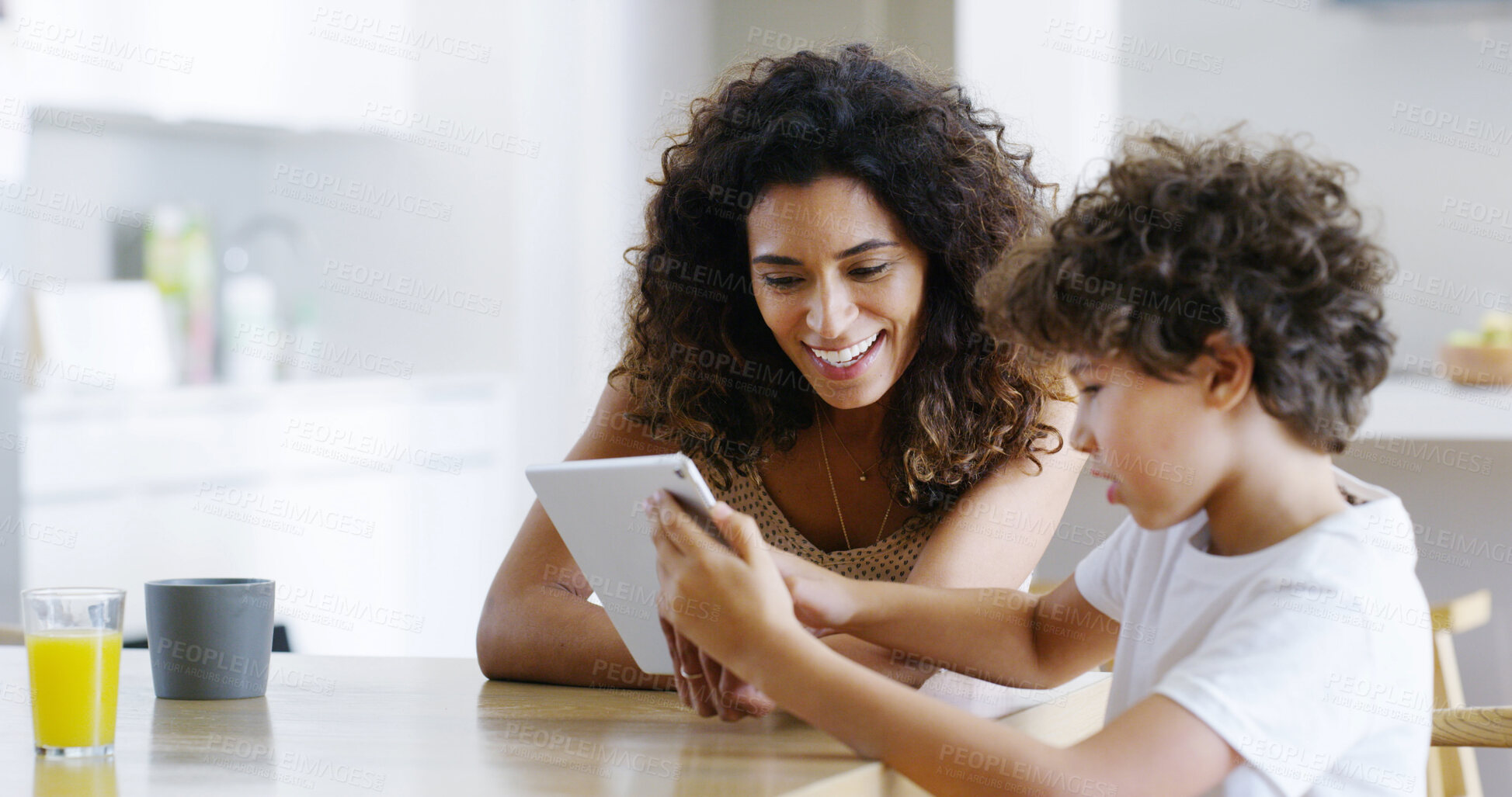 Buy stock photo Mother, tablet and child for education, elearning and studying for future and knowledge. Boy, student and kitchen for teaching, homework or support for home school or development with assessment