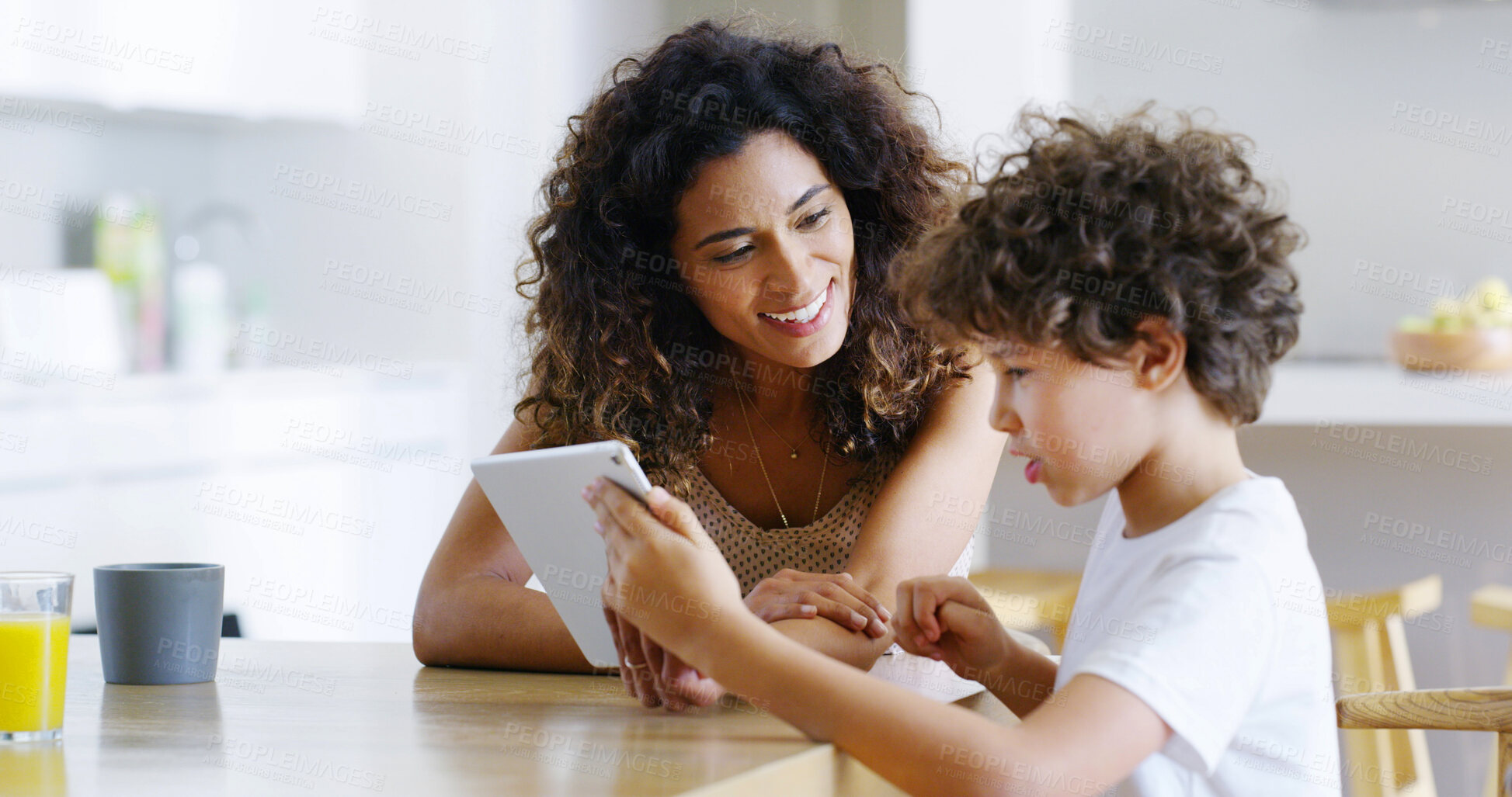 Buy stock photo Mother, tablet and child for education, elearning and studying for future and knowledge. Boy, student and kitchen for teaching, homework or support for home school or development with assessment