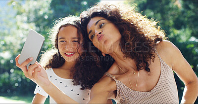 Buy stock photo Selfie, pout and mother with daughter in park for social media, memory and bonding. Love, support and photography with woman and young girl in nature for picture, family and summer vacation together