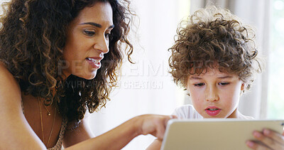 Buy stock photo Mother, tablet and pointing for education, elearning and studying for future and knowledge. Boy, student and kitchen for teaching, homework or support for home school or development with assessment