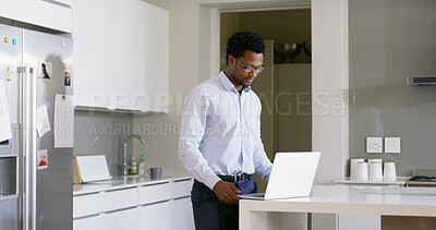 Buy stock photo Businessman, laptop and thinking with remote work, agency and ideas for solution or brainstorming. African, entrepreneur or brand consultant with project, proposal or online startup in home kitchen