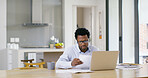 Businessman, laptop and documents with remote work, agency and ideas for solution or brainstorming. African, entrepreneur or brand consultant with project, proposal or online startup in home kitchen
