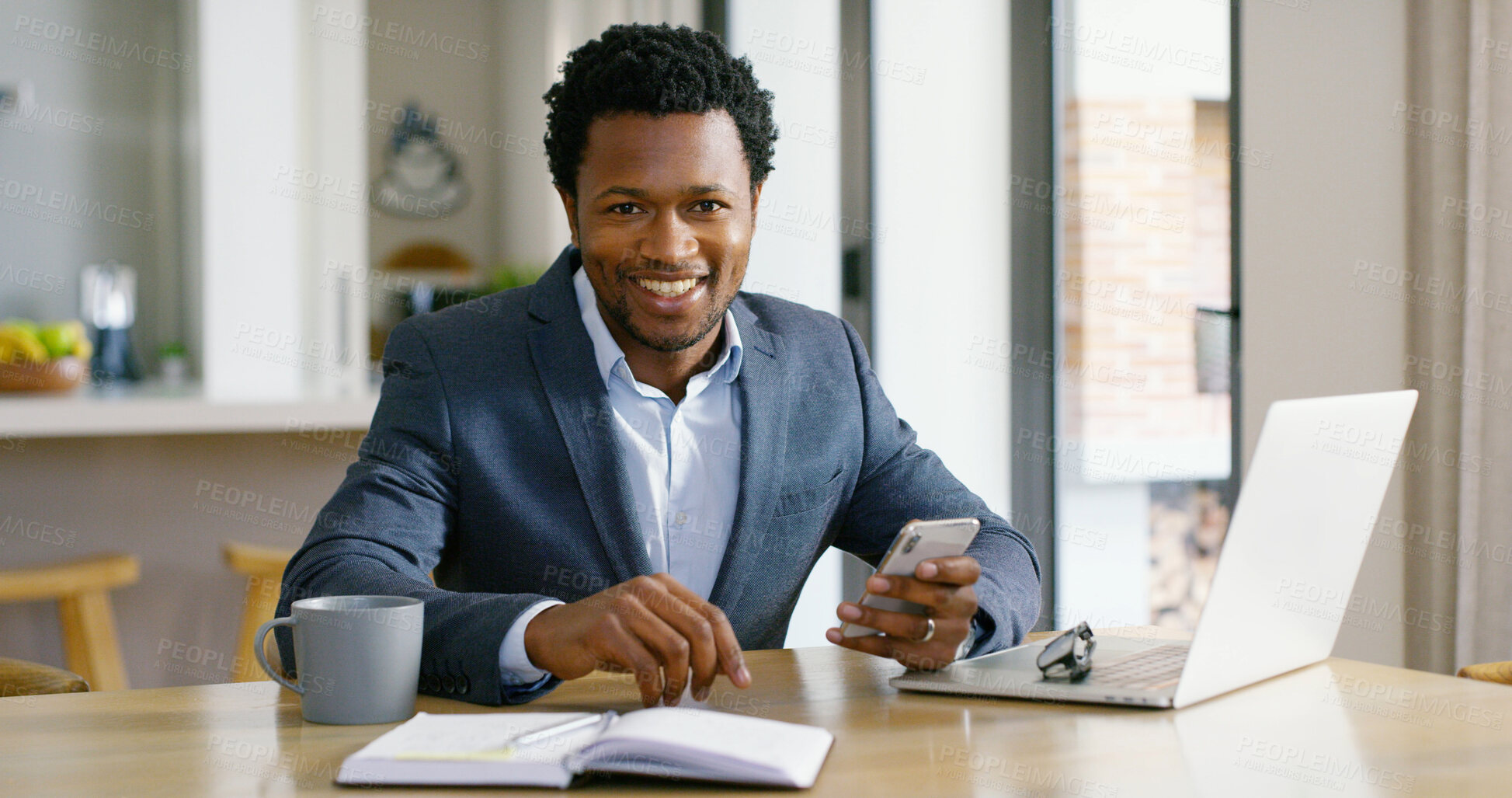 Buy stock photo Black man, laptop and portrait with work from home and phone for social media of professional with online business. Startup, smile and website update for freelancer and technology at kitchen table