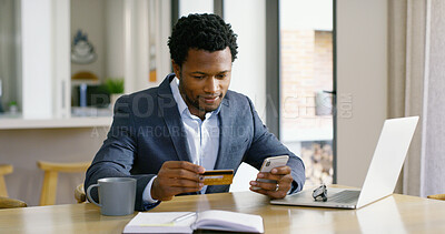 Buy stock photo African businessman, phone and credit card for online shopping, ecommerce and purchase at home. Accountant, laptop and payment for subscription, review or sales with retail, technology and customer