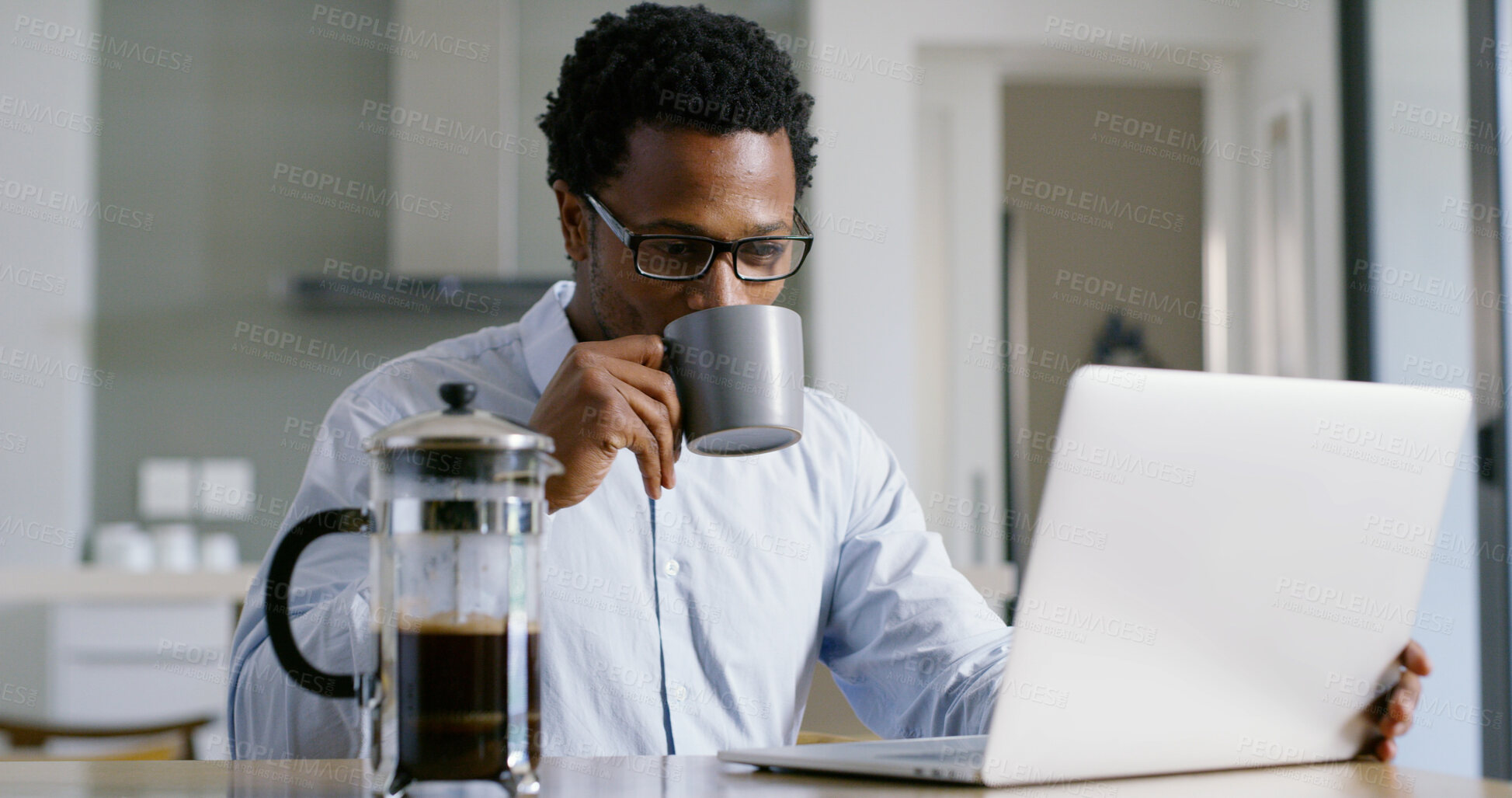 Buy stock photo Businessman, laptop and coffee break with remote work, thinking and ideas for solution or brainstorming. African, entrepreneur or brand consultant with project, proposal or startup in home kitchen