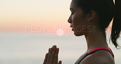 Buy stock photo Peace, girl and meditation with yoga at ocean for spiritual fitness, mindfulness and holistic healing. Active woman, mindset and pilates with mental health, self care and wellness space for sunrise