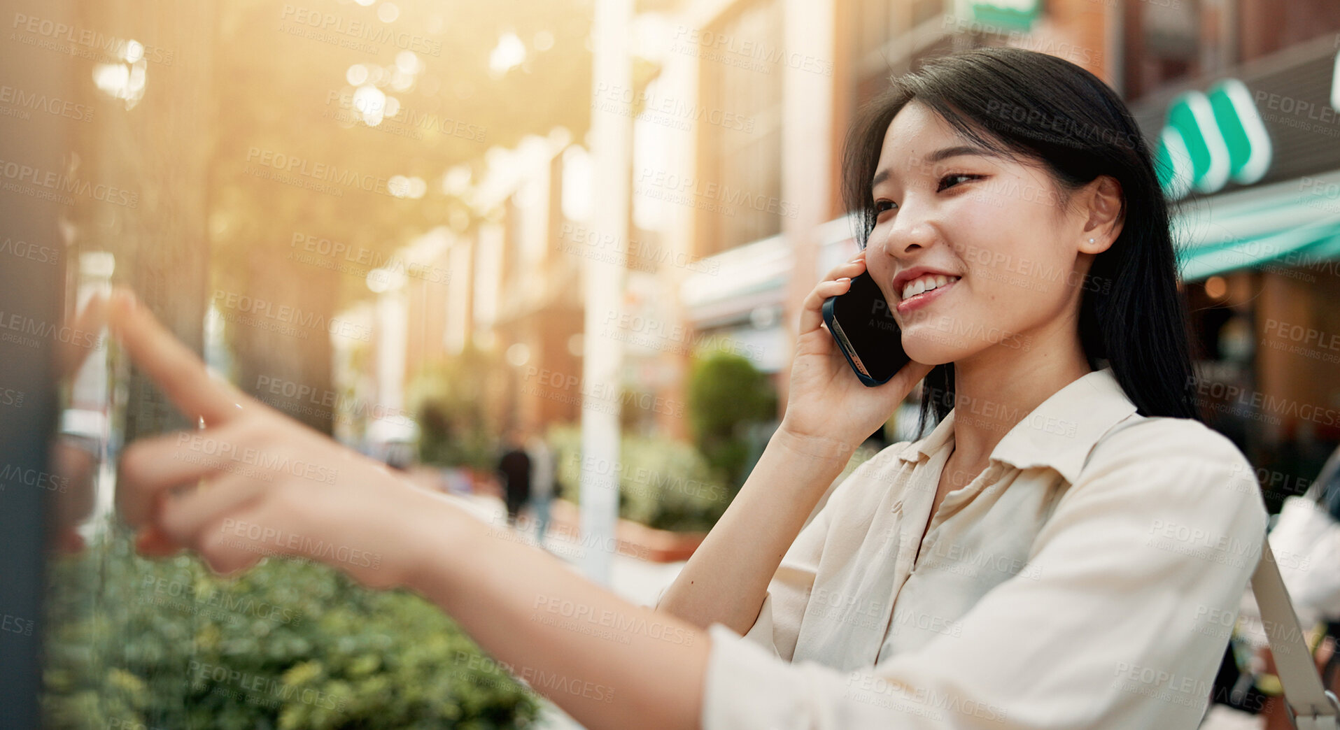 Buy stock photo Phone call, communication and woman in city for travel, vacation or weekend trip with direction board. Happy, cellphone and Japanese female person on mobile conversation for networking o holiday.