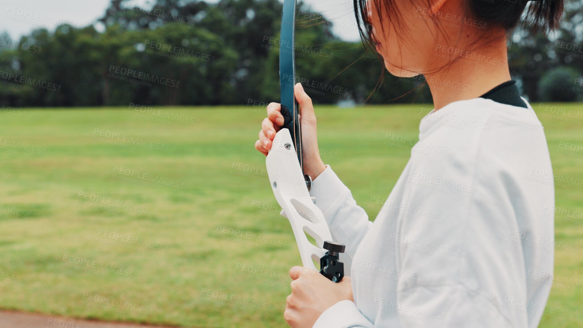 Buy stock photo Girl, bow or hands of archer for sports training, field or preparing for competition, equipment or game. Archery, athlete or shooting range in tournament with skills, challenge and practice in Japan