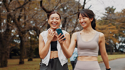 Buy stock photo Japan, funny and women with smartphone, exercise and typing with social media. Sports meme, outdoor and friends with cellphone, fitness and technology for online reading, digital app or workout goals