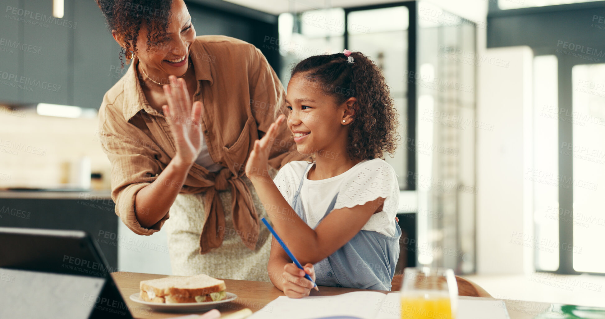 Buy stock photo Girl, mom and high five with learning, homework and happy for solution, goals and support in house. People, mother and daughter with cheers, celebration and scholarship with education at family home