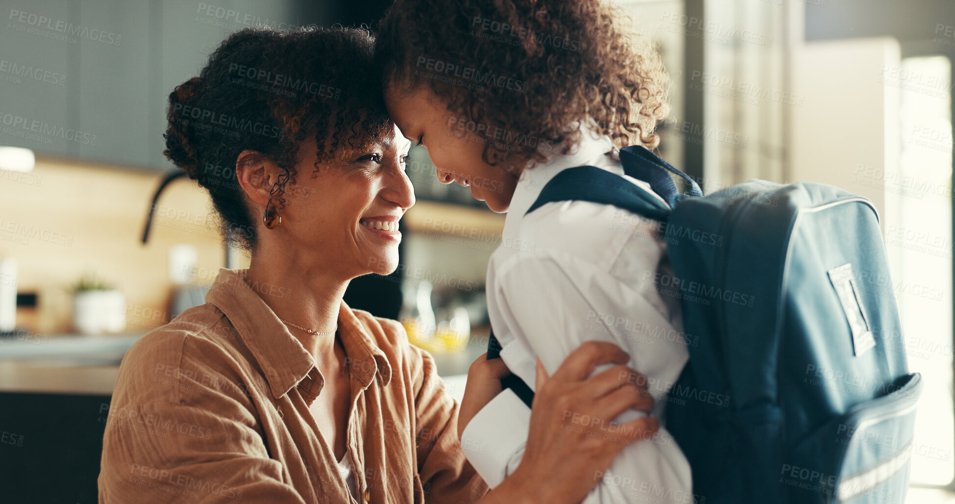 Buy stock photo Mother, girl and uniform with forehead touch in home for preparing or ready for elementary education. Apartment, people and parent with kid for back to school with smile, pride or child development