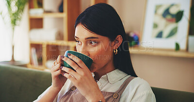 Buy stock photo Home, relax and woman on sofa, coffee and comfort with aroma, thoughtful and resting in living room. Person, apartment and girl on couch, cappuccino and latte with herbal tea, thinking and break