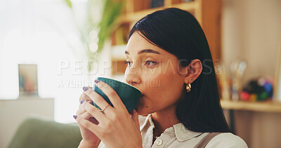 Buy stock photo House, relax and woman on sofa, coffee and comfortable with drinking, break and thinking in living room. Person, apartment and girl on couch, cappuccino and latte with herbal tea and thoughtful