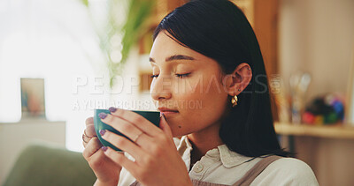 Buy stock photo House, smelling and woman on couch, coffee and comfort with aroma, break and resting in living room. Person, apartment and girl on sofa, cappuccino and latte with herbal tea, gratitude and relaxing