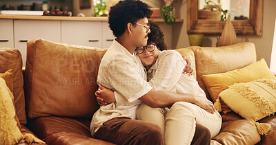 Buy stock photo Happy couple, bonding and home with hug, love and together on couch in living room for relax. Woman, man and relationship for connection as partners for embrace, peace and affection on sofa in cuddle