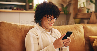 Buy stock photo Smartphone, woman and mobile app on couch with smile, texting or communication in home for relax. Female person, typing and happy on technology in apartment for post, online or website in living room