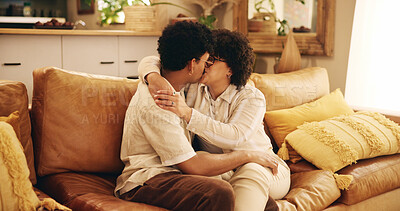 Buy stock photo Young couple, love and home with kiss, embrace and together in living room for affection. Woman, man and relationship for connection as romantic partner for bonding, happiness or support on honeymoon