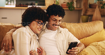 Buy stock photo Love, relax and phone with couple on sofa for streaming, bonding and social media post. Networking app, connection and share link with man and woman in living room of home for subscription service