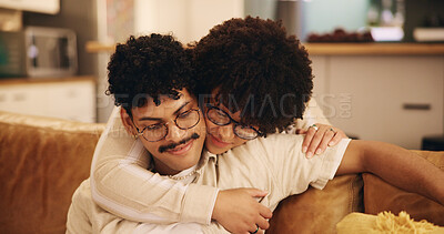 Buy stock photo Happy couple, bonding and home with love, hug and together on couch in living room for relax. Woman, man and relationship for connection as romantic partner for embrace, peace and affection in lounge