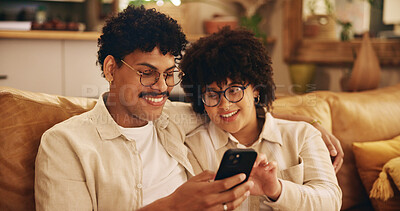 Buy stock photo Relax, show and phone with couple on sofa for streaming, bonding and social media post. Networking app, connection and share link with man and woman in living room of home for subscription service