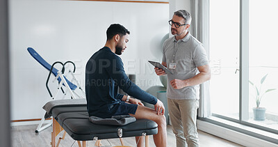 Buy stock photo Physiotherapy, tablet and knee pain with man and athlete in clinic for rehabilitation, healthcare or consulting. Support, medical and chiropractor with people for healing, advice or physical therapy 