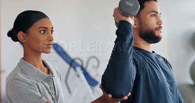 Buy stock photo Support, man and woman in physiotherapy with dumbbell for fitness, muscle workout or exercise. Rehabilitation, physiotherapist and patient in office together for help, strength or mobility training