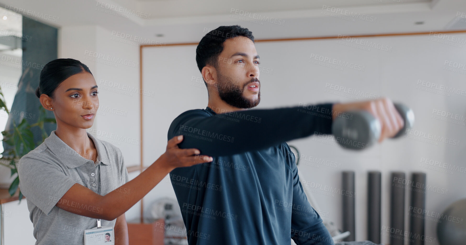 Buy stock photo Help, man and woman in physiotherapy with dumbbell for fitness, muscle workout or exercise. Rehabilitation, physiotherapist and patient in office together for exercise, strength or mobility training