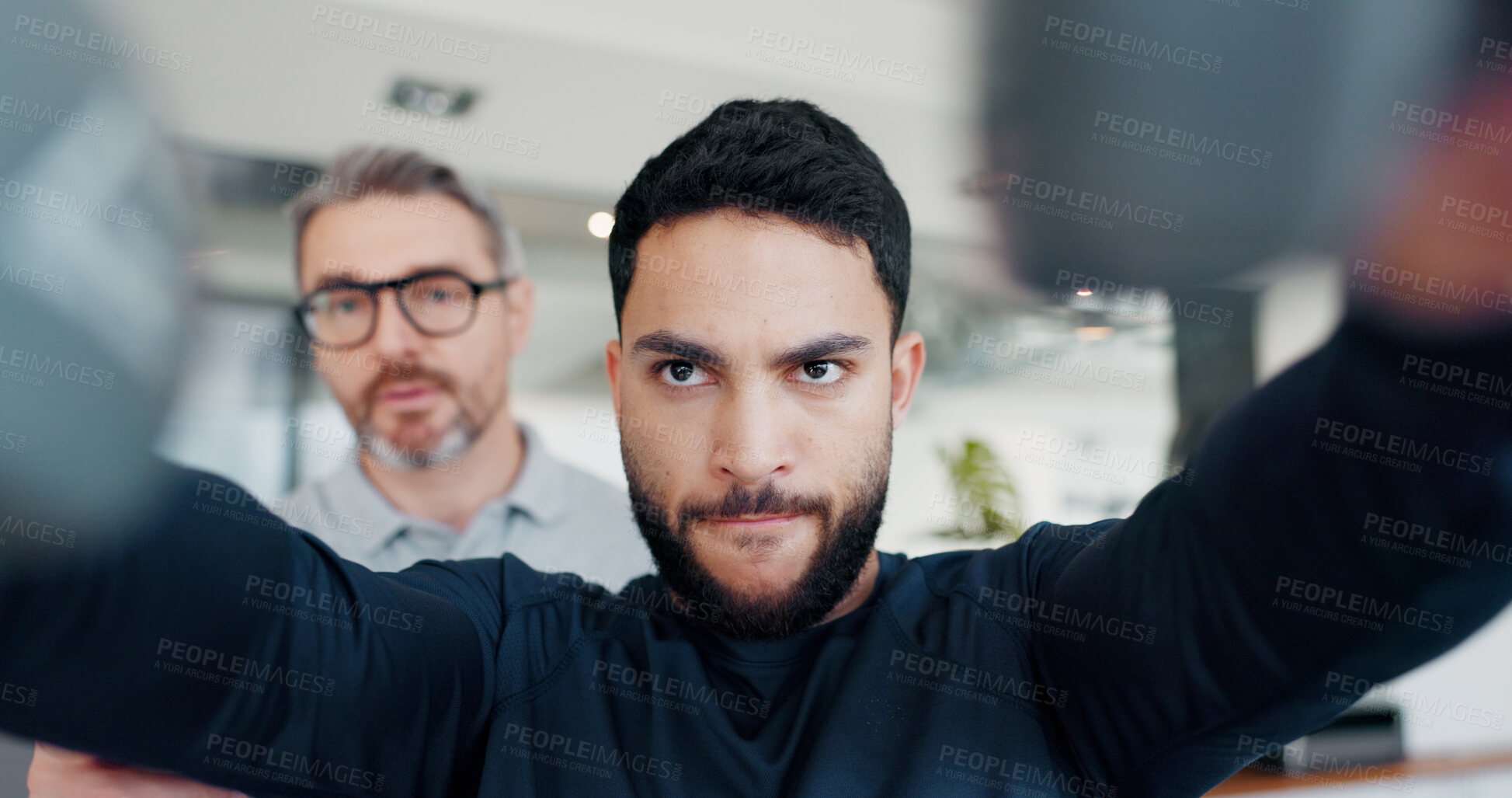 Buy stock photo Man, physiotherapist and dumbbells with recovery at clinic with help, support and muscle for progress. Person, biokinetics and weightlifting for rehabilitation from injury with exercise at hospital