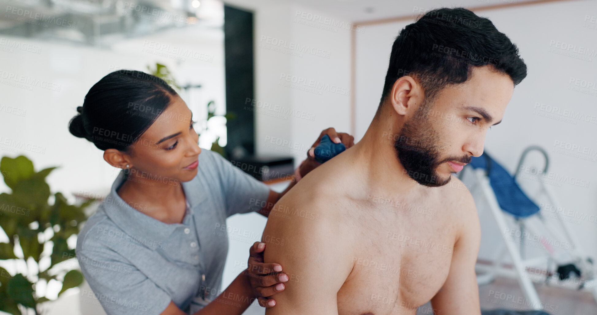 Buy stock photo Massage ball, physiotherapy and shoulder with people in clinic for deep tissue pressure, tension and healthcare. Medical, rehabilitation and muscle with woman and man for support, help and healing