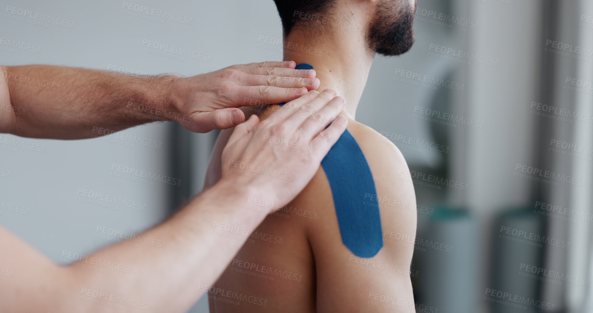 Buy stock photo Physiotherapist, person and hands with tape for recovery, injury and guide for health at clinic. People, help and support with exercise for shoulder pain with muscle in rehabilitation at hospital