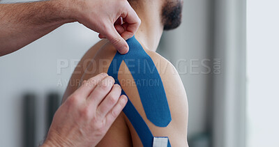 Buy stock photo Physiotherapist, patient and hands with tape for recovery, injury and guide for health at clinic. People, help and support with application for shoulder pain with muscle in rehabilitation at hospital