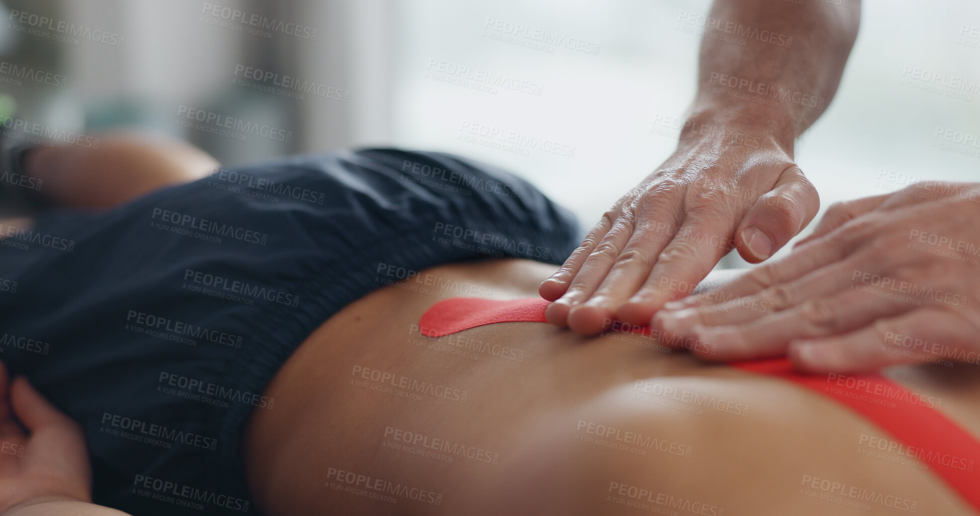 Buy stock photo Physiotherapist, hands and tape for back pain with recovery process for injury, help and bed at clinic. People, biokinetics and treatment for rehabilitation with muscle, spine and service at hospital