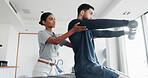 Support, man and woman in physiotherapy with weights for fitness, muscle workout or exercise. Rehabilitation, physiotherapist and patient in office together for help, dumbbell and mobility training