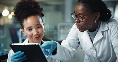 Buy stock photo Science, women and tablet in lab for advice, feedback and pointing with problem solving at night. Research team, tech and idea in facility for scientific study, pharmaceutical development or deadline