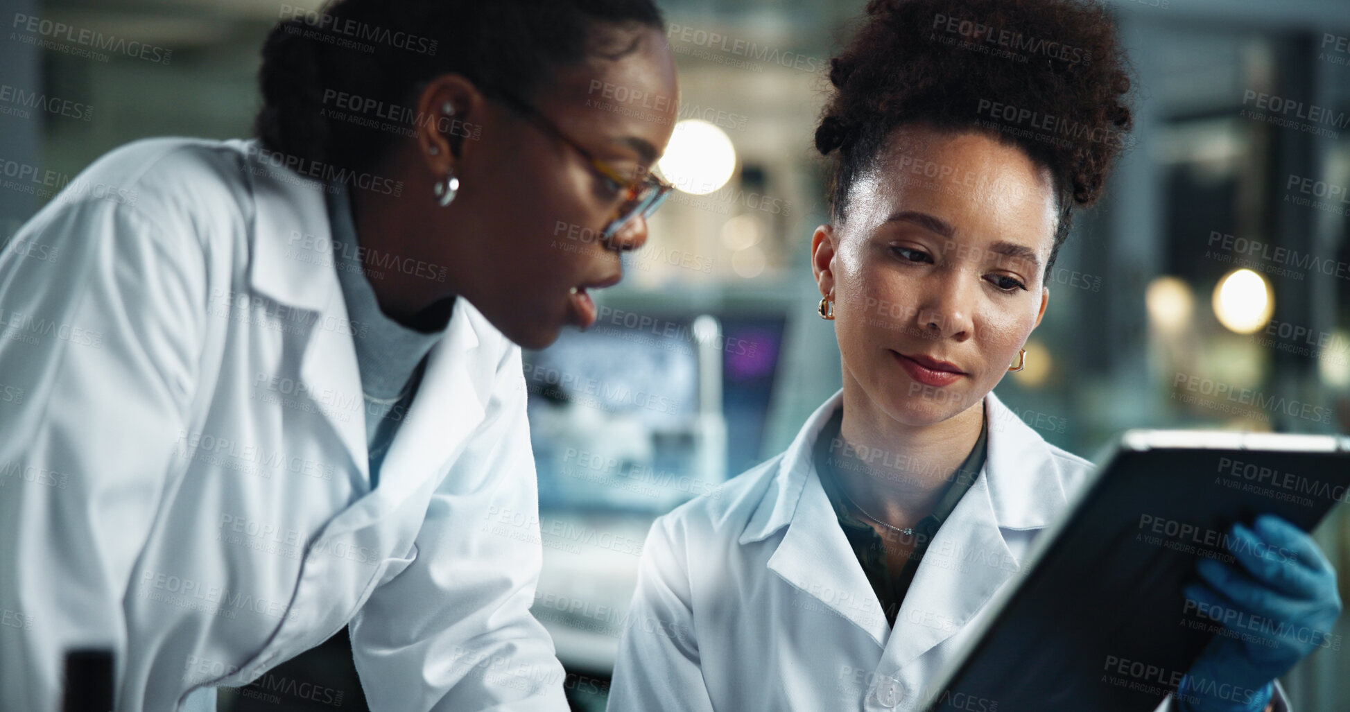 Buy stock photo Science, women or reading in lab with tablet, feedback and scientific research at night. Scientist team, tech or brainstorming in facility for deadline advice, pharmaceutical development or app study