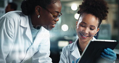 Buy stock photo Science, women and smile in lab with tablet, feedback and scientific innovation at night. Research team, tech and pleased with results in facility for advice, pharmaceutical development and overtime