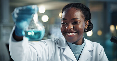 Buy stock photo Scientist, black woman and beaker with smile for biochemistry, experiment and pathology breakthrough. Chemical, analysis and liquid sample for inspection, pharmaceutical development and DNA study