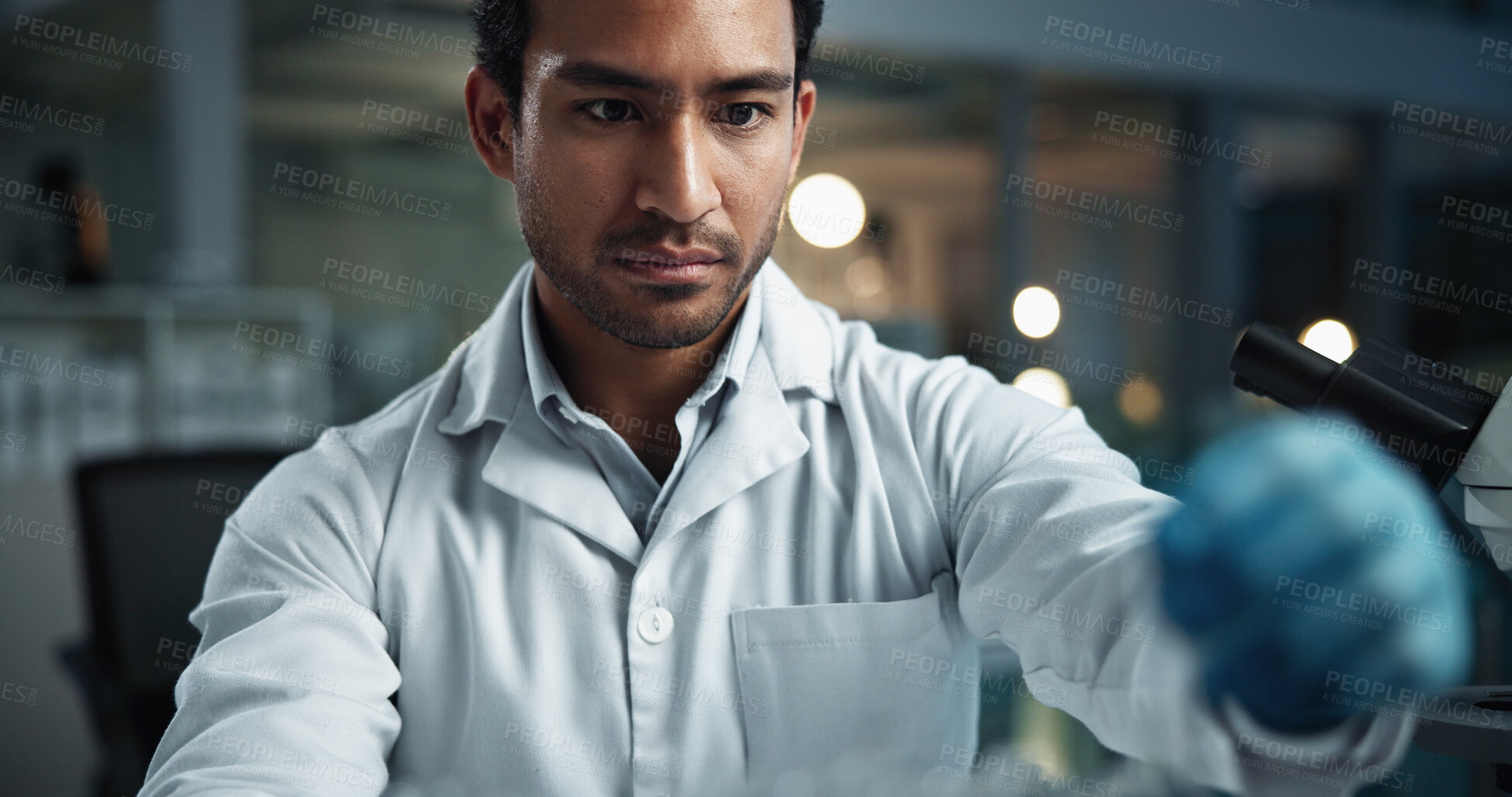 Buy stock photo Scientist, man and film for microscope in lab with chemical reaction, check and process for vaccine development. Person, study and medical research with insight for drugs in pharmaceutical trial