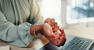 Buy stock photo Business woman, hands and wrist pain with laptop for injury, discomfort or carpal tunnel syndrome at office. Closeup, female person or employee with sore palm for joint inflammation, sprain or strain