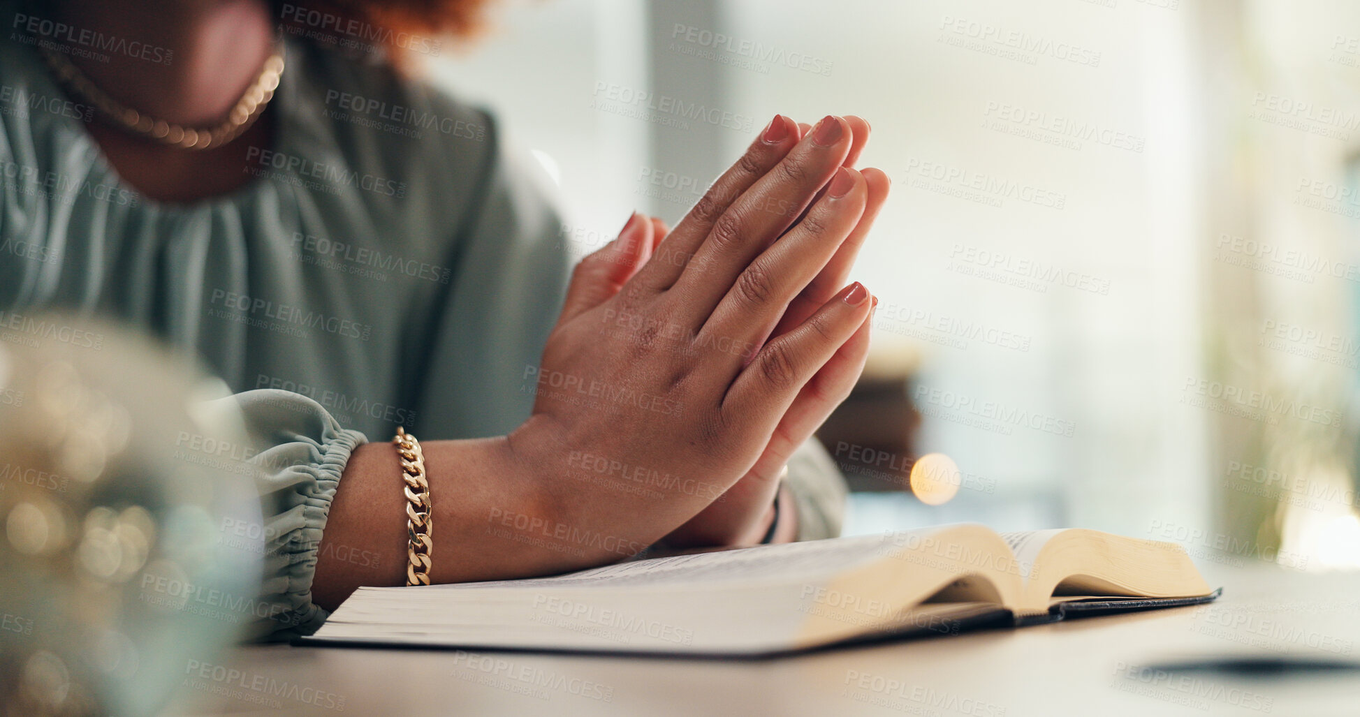 Buy stock photo Hands, prayer and bible for faith in home with worship, peace or study for spiritual guide. Person, Christian book and religion for reflection, scripture or search for connection to God at apartment