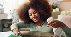 Spring cleaning, home and woman with chemical, lounge and disinfectant for table, spray and apartment. Chores, hygiene and person with cloth for dust, sanitizer and polishing of furniture and house