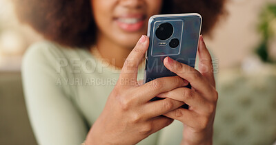 Buy stock photo Hands, phone and woman in home to relax, texting or check social media blog post online. Closeup, mobile or person in living room for communication, news notification or download chat app on internet