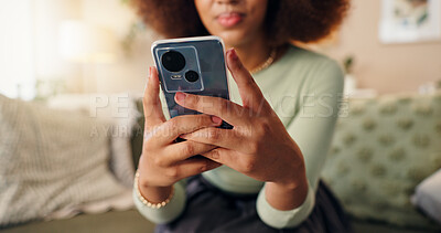 Buy stock photo Hands, phone and woman in home on internet, texting or check social media blog post online. Closeup, mobile or person in living room for communication, news notification or download chat app to relax