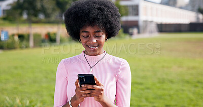 Buy stock photo Phone, happy and black woman in city typing for communication, networking or contact with mobile app. Tech, travel and person with smile on social media with cellphone outdoor in park for texting