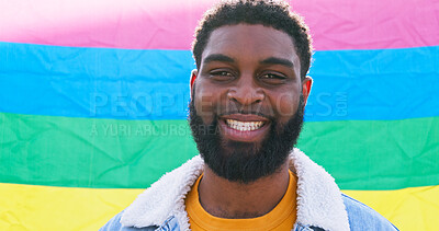 Buy stock photo Man, portrait and happy at rainbow flag for pride, human rights and LGBT awareness in Brazil. Activist, smile and face at colorful background for voice, freedom equality or symbol for queer community