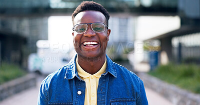 Buy stock photo Black man, smile and portrait for travel in city with pride, confidence and outdoor in sunshine on metro road. Person, happy and excited for commute, journey or adventure on urban sidewalk in Nigeria