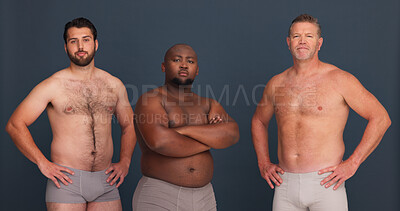 Buy stock photo Portrait, body positivity and confident men in underwear with support, inclusion and unique identity in studio. Diversity, solidarity and male friends with pride, arms crossed and grey background