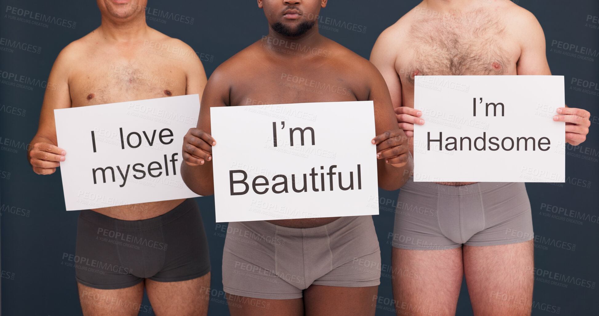 Buy stock photo Men, self love and poster in studio for body positivity, underwear and confidence in appearance. People, messages and pride on dark background with support, empowerment and voice with diversity